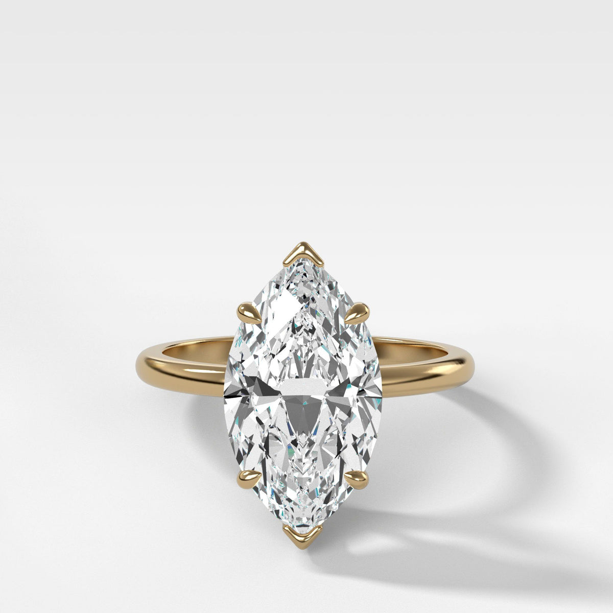 Crescent Solitaire With Marquise Cut by Good Stone in Yellow Gold