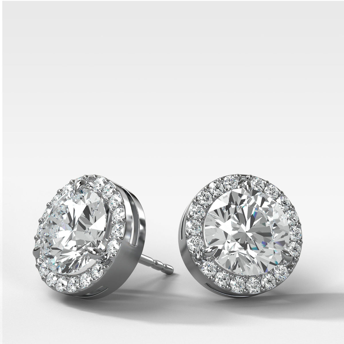 Round Cut Single Point Prong Studs With Micro Pavé Halo by Good Stone in White Gold