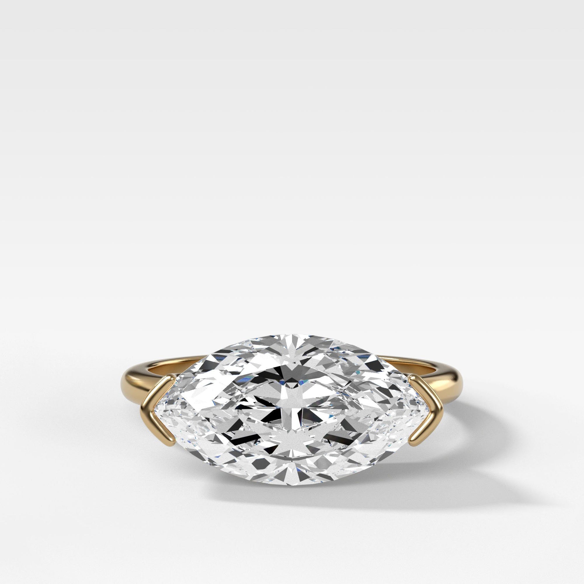 East West Half Bezel Solitaire Engagement Ring With Marquise Cut by Good Stone in Yellow Gold