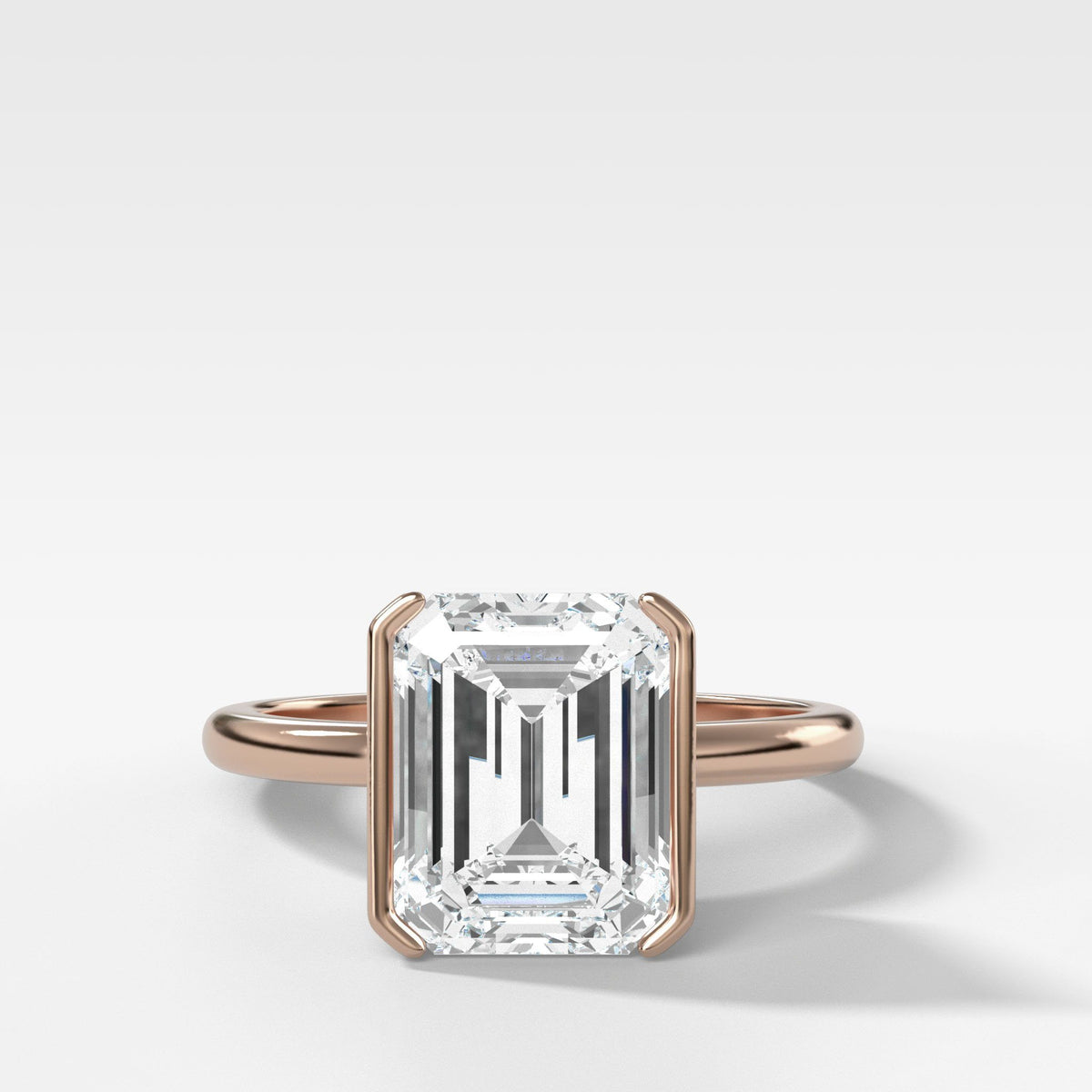 North South Half Bezel Solitaire Engagement Ring With Emerald Cut by Good Stone in Rose Gold