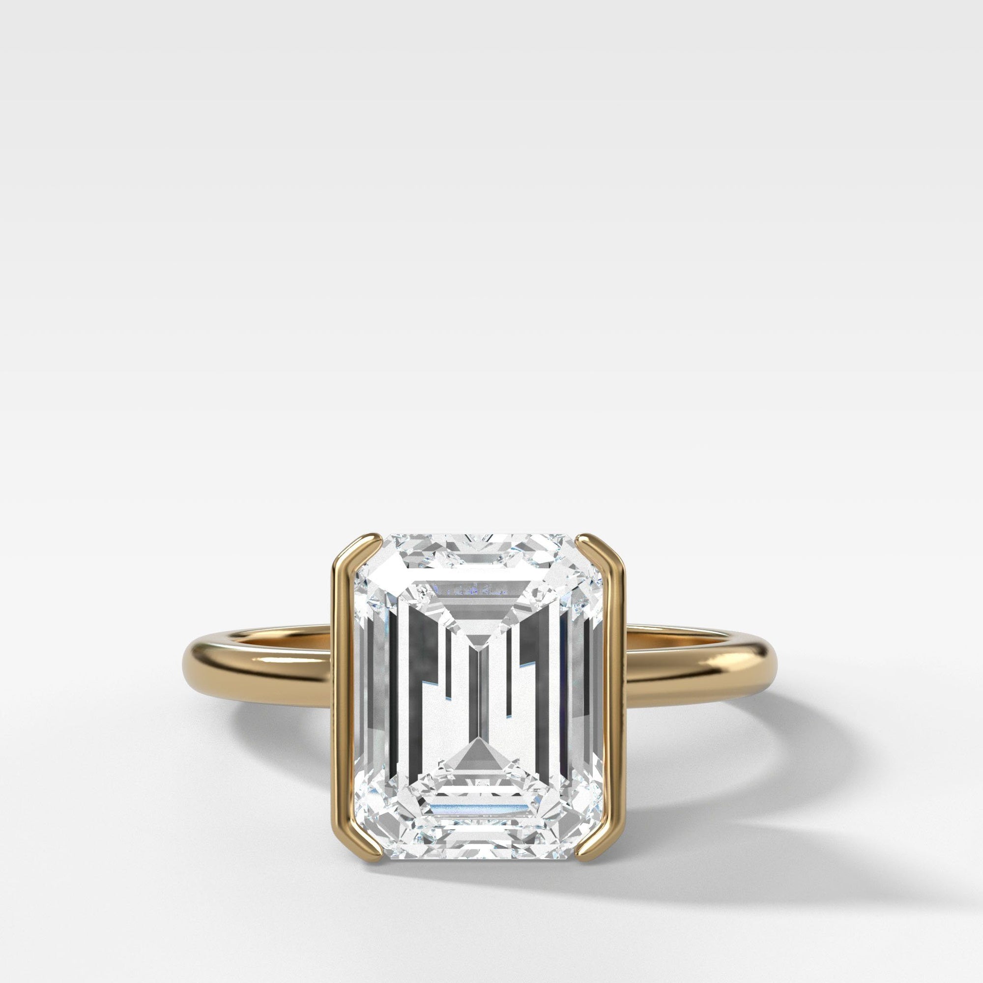 North South Half Bezel Solitaire Engagement Ring With Emerald Cut by Good Stone in Yellow Gold