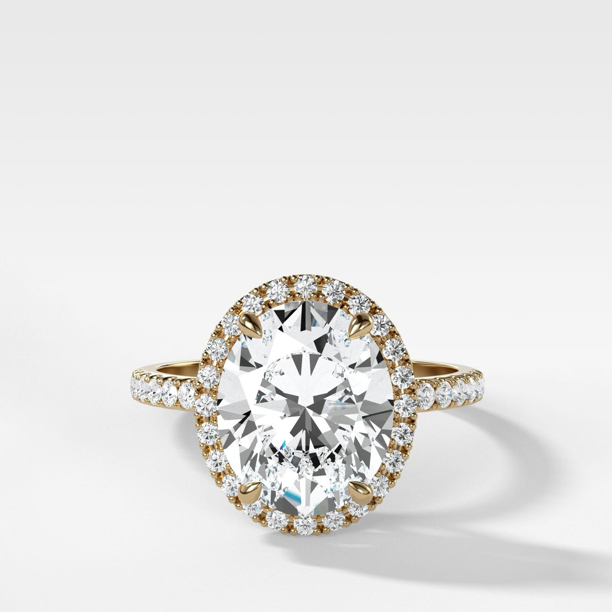 Aurora Pave Halo Ring With Oval Cut by Good Stone in Yellow Gold