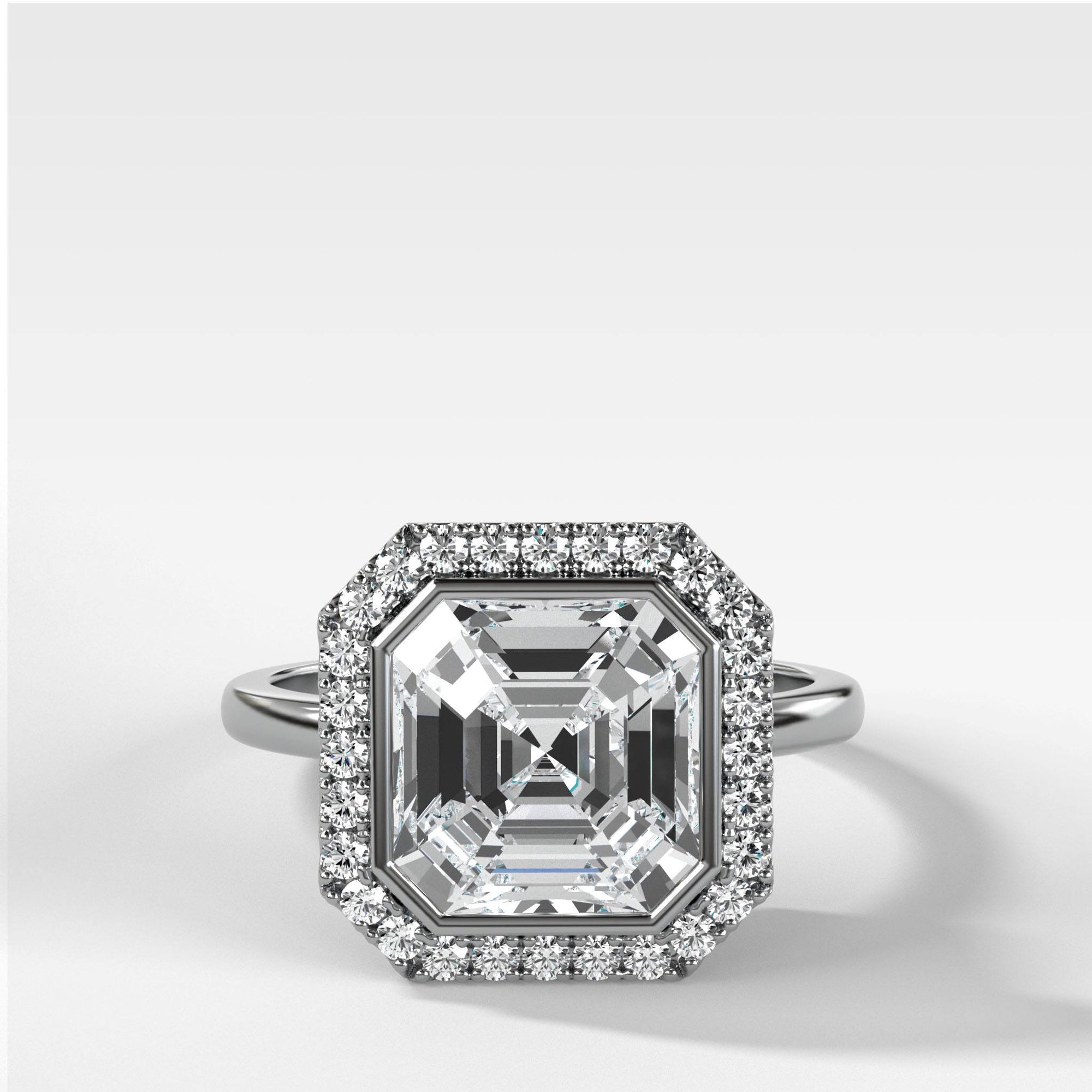 Bezel Set Halo Engagement Ring With Asscher Cut by Good Stone in Yellow Gold