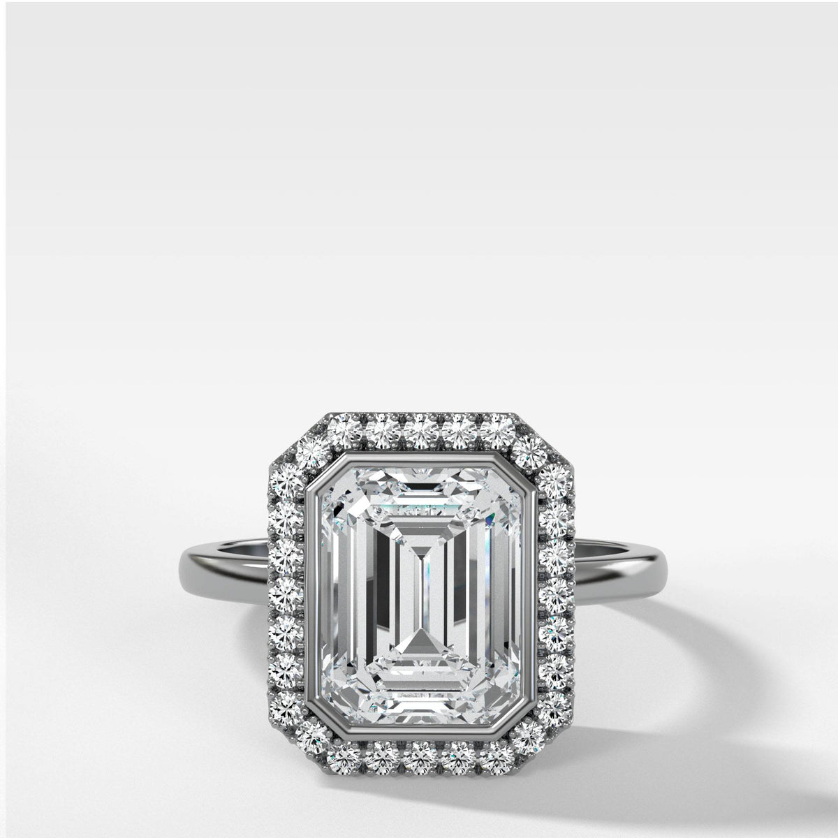 Bezel Set Halo Engagement Ring With Emerald Cut by Good Stone in White Gold