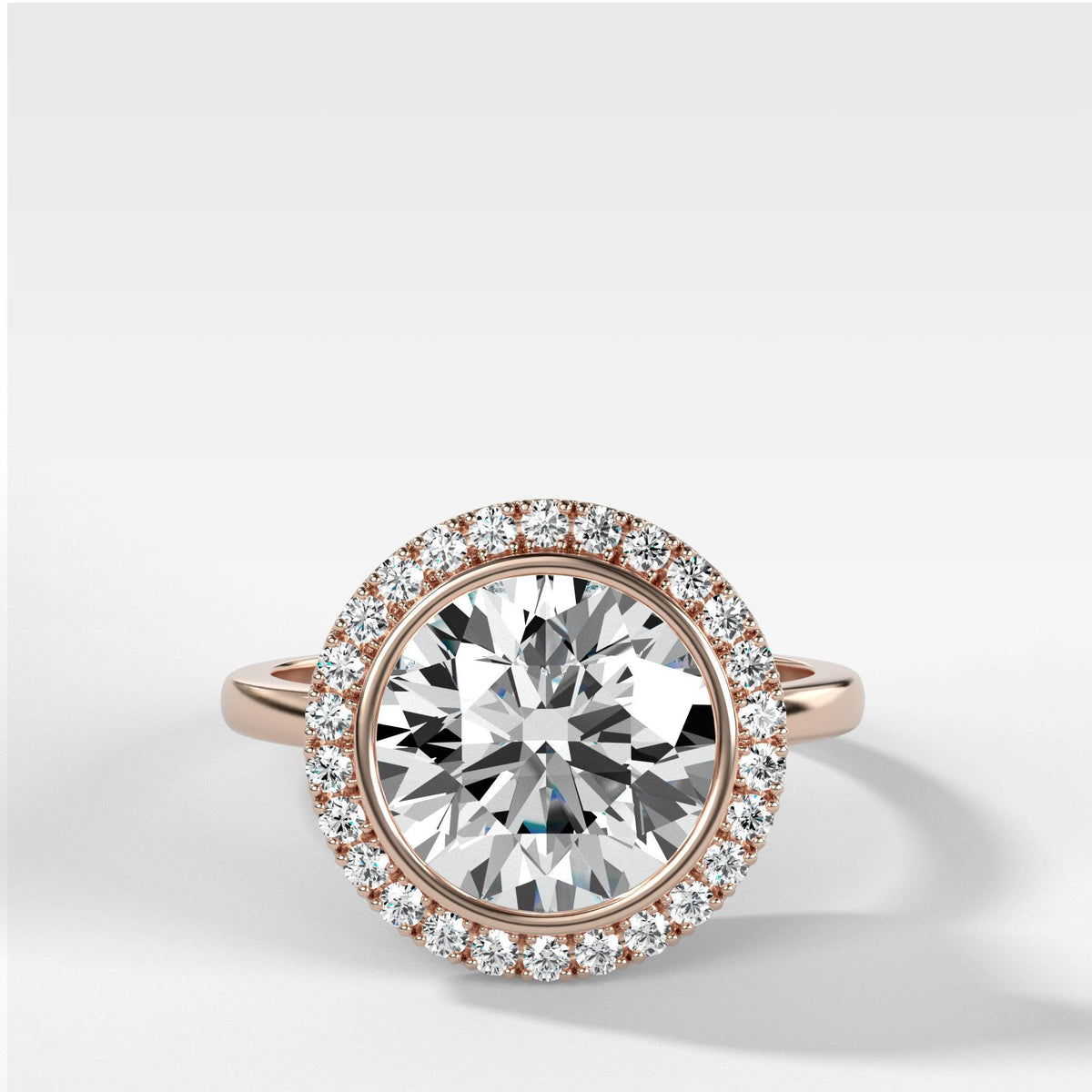 Bezel Set Halo Engagement Ring With Round Cut by Good Stone in Rose Gold