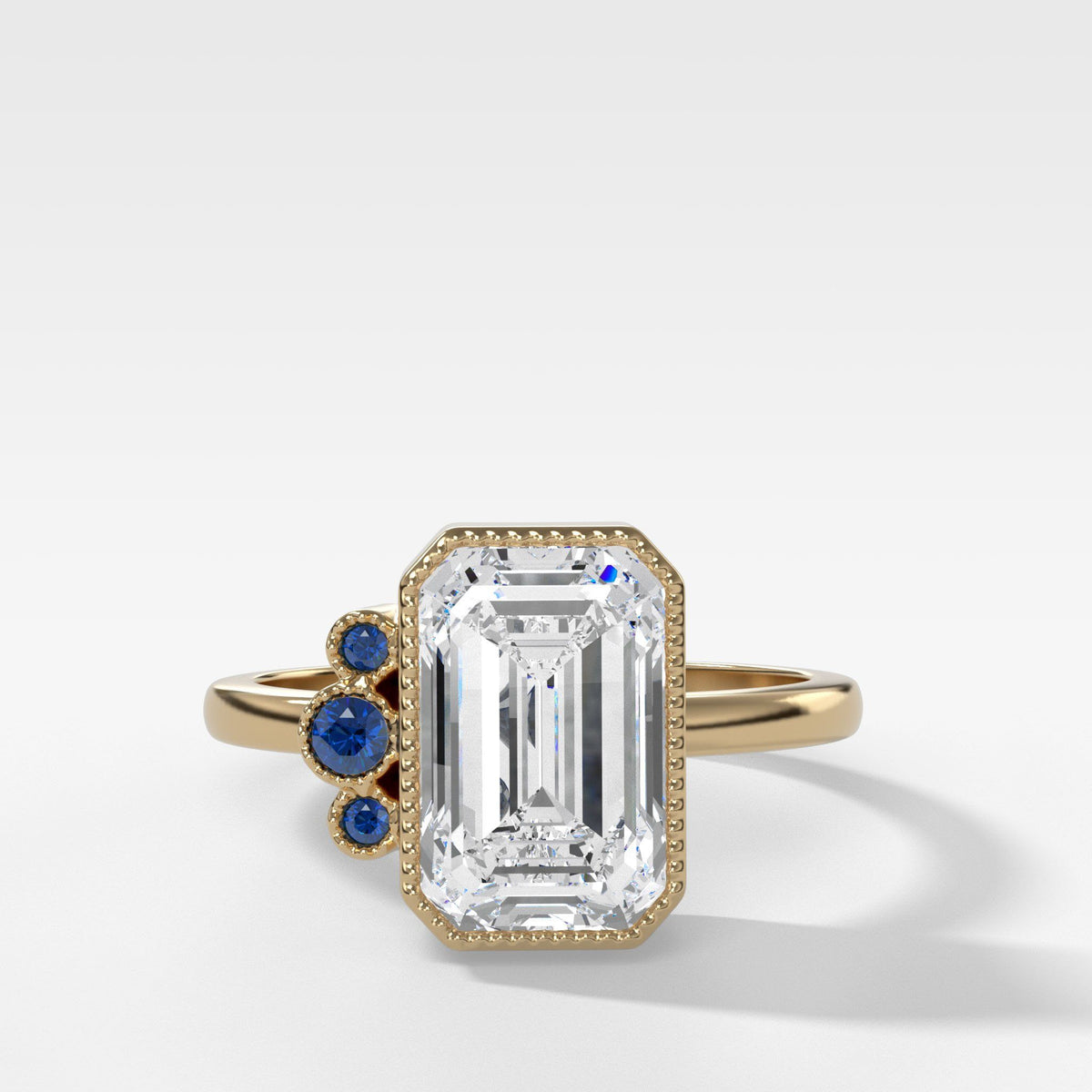 Blue Cluster Engagement Ring With Emerald Cut by Good Stone in Yellow Gold