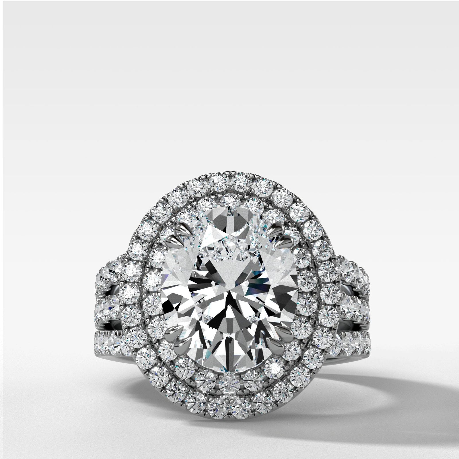 Double Halo Triple Shank Engagement Ring With Oval Cut by Good Stone in Yellow Gold