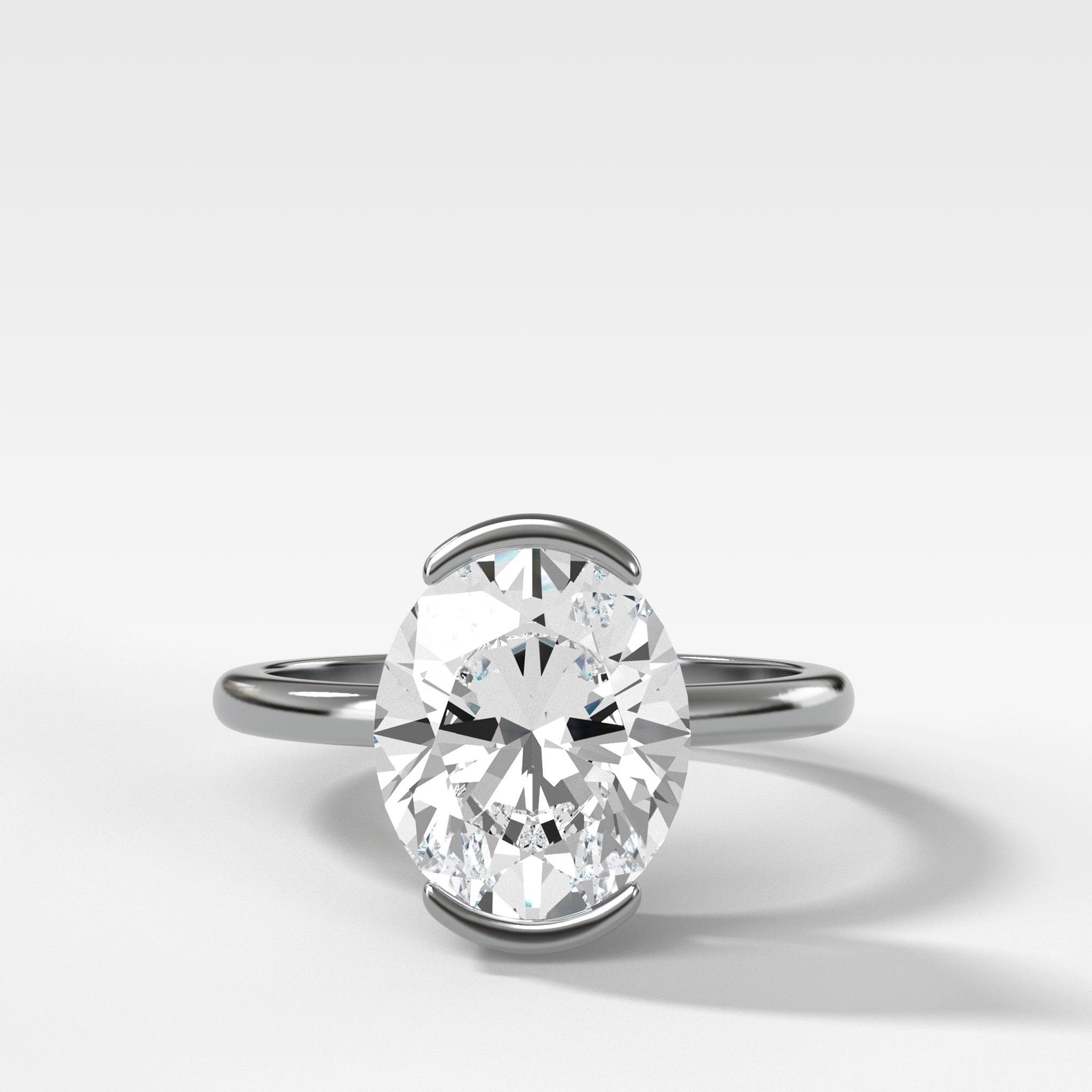 North South Half Bezel Solitaire Engagement Ring With Oval Cut by Good Stone in Yellow Gold