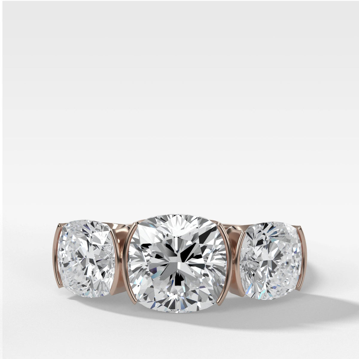 Half Bezel Triad Engagement Ring With Cushion Cut by Good Stone in Rose Gold