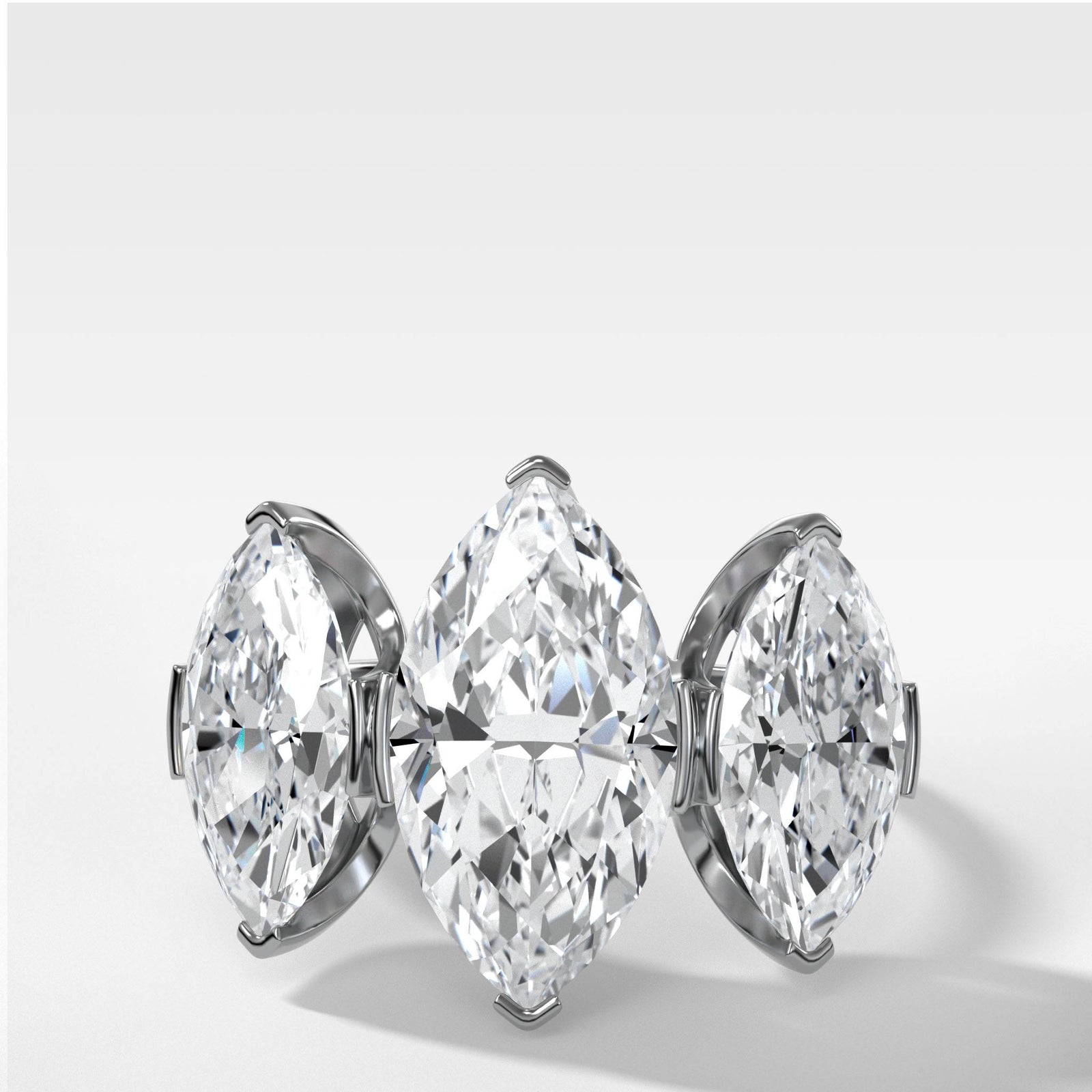 Half Bezel Triad Engagement Ring With Marquise Cut by Good Stone in Yellow Gold