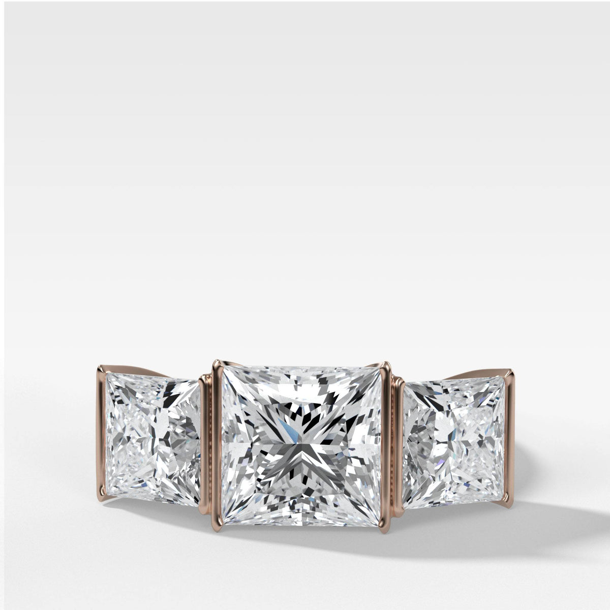 Half Bezel Triad Engagement Ring With Princess Cut by Good Stone in Rose Gold
