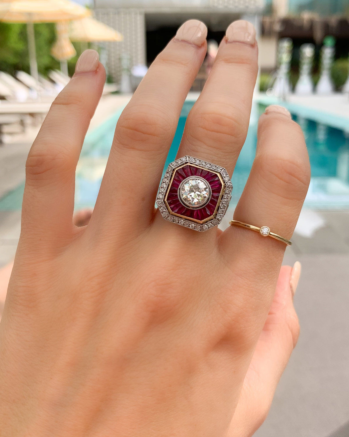 Vintage Ruby And Diamond Two Tone Art Deco Halo Setting by Good Stone available in Gold and Platinum
