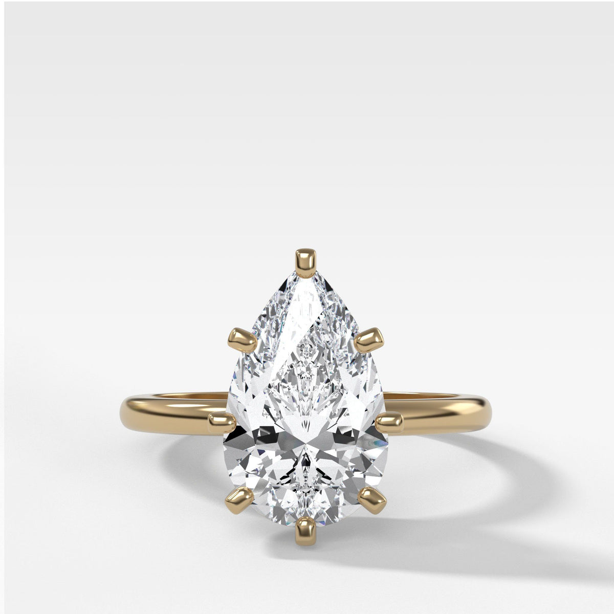 Nova Solitaire With Pear Cut by Good Stone in Yellow Gold