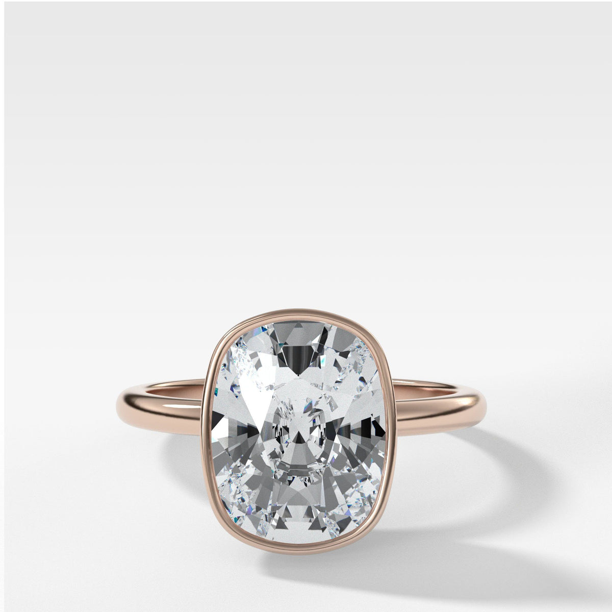 Bezel Penumbra Solitaire With Elongated Cushion Cut by Good Stone in Rose Gold