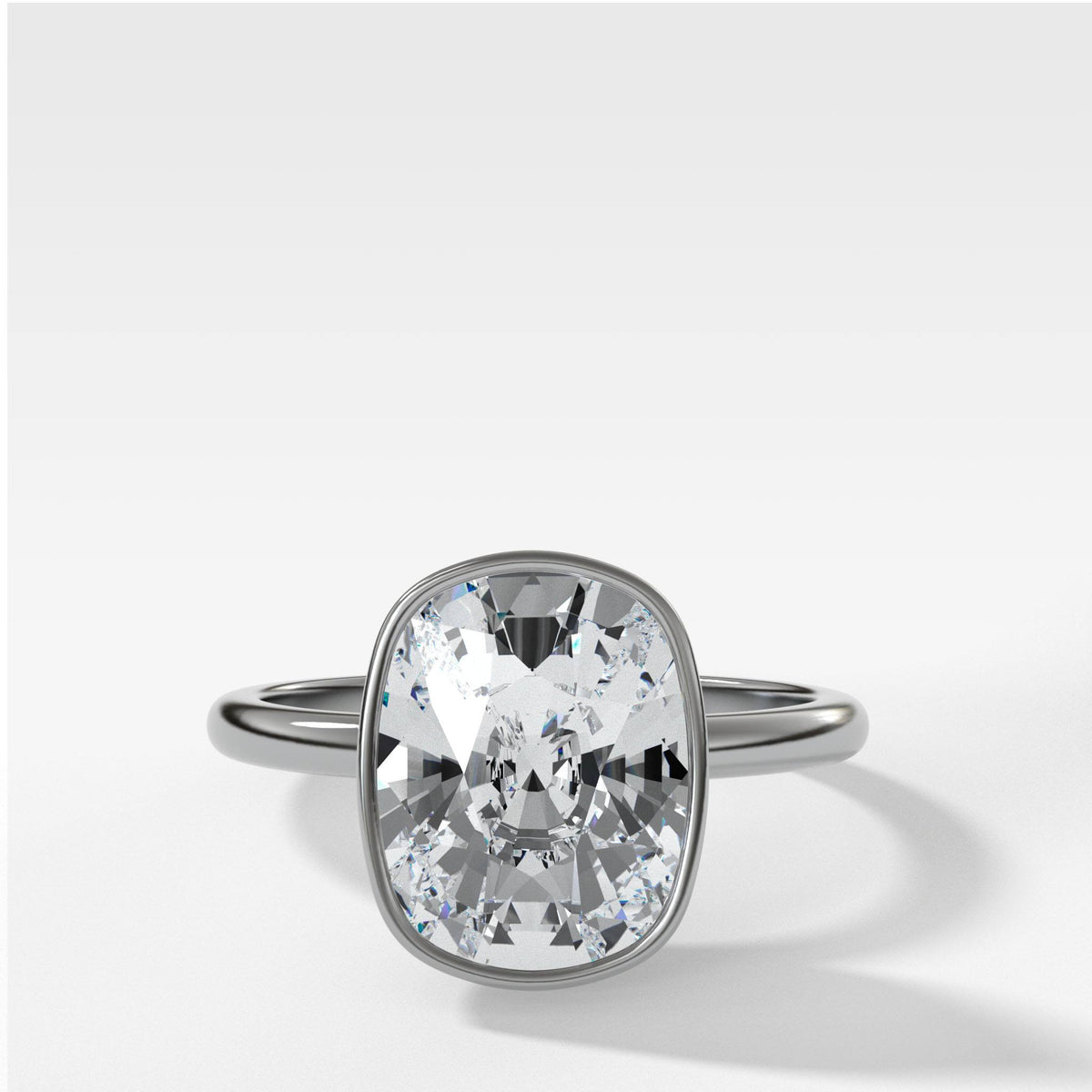 Bezel Penumbra Solitaire With Elongated Cushion Cut by Good Stone in White Gold