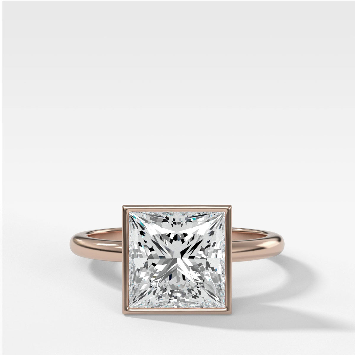 Bezel Penumbra Solitaire With Princess by Good Stone in Rose Gold