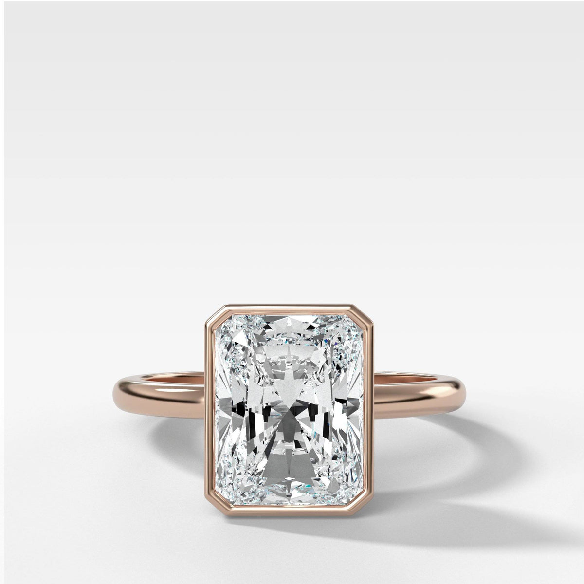 Bezel Penumbra Solitaire With Radiant Cut by Good Stone in Rose Gold