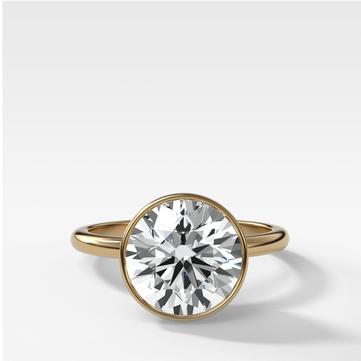 Petite Bezel Set Round Cut diamond Engagement Ring In 14K Yellow Gold |  Fascinating Diamonds