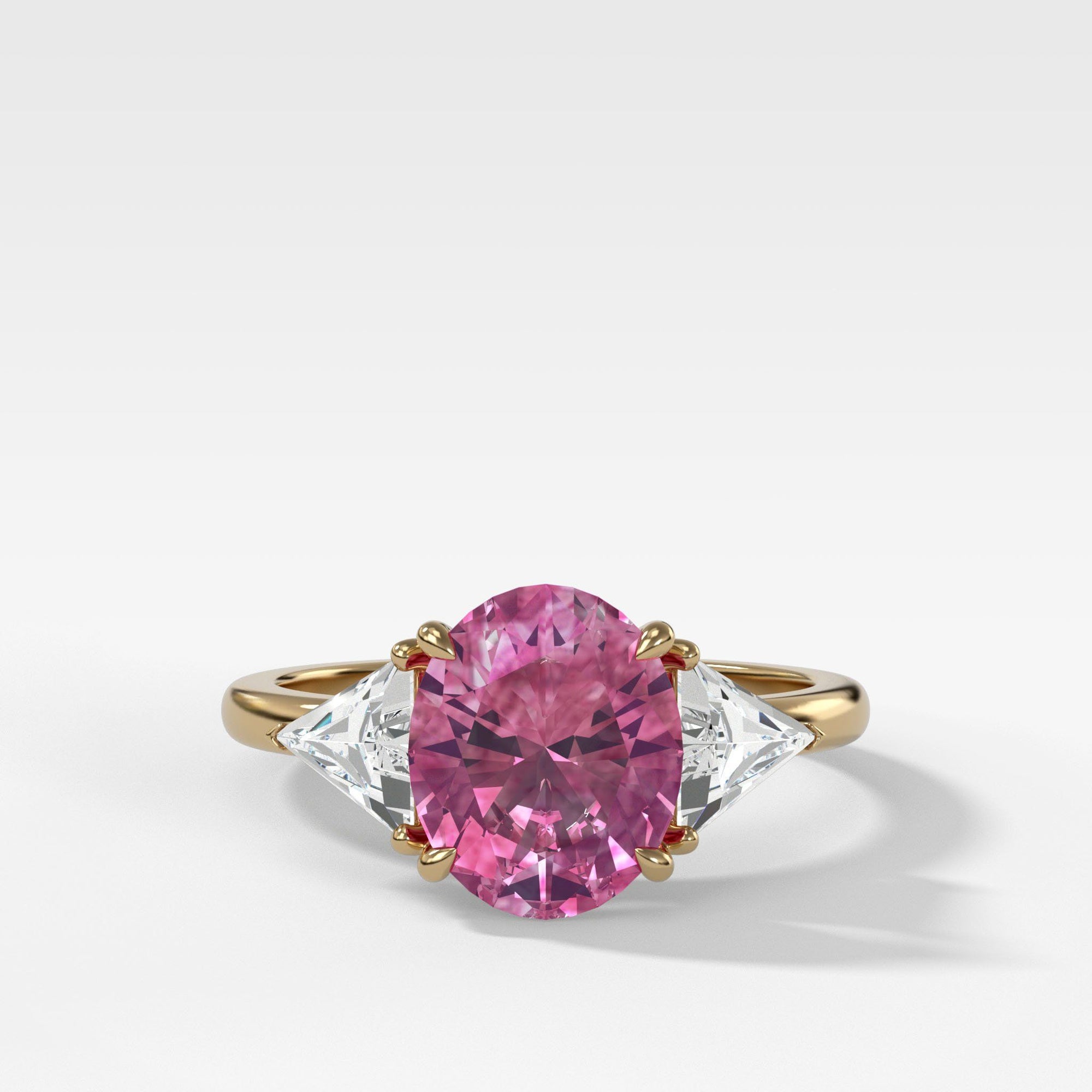 Pink Sapphire Three Stone Ring with Trillion Diamond Sides by Good Stone in Yellow Gold