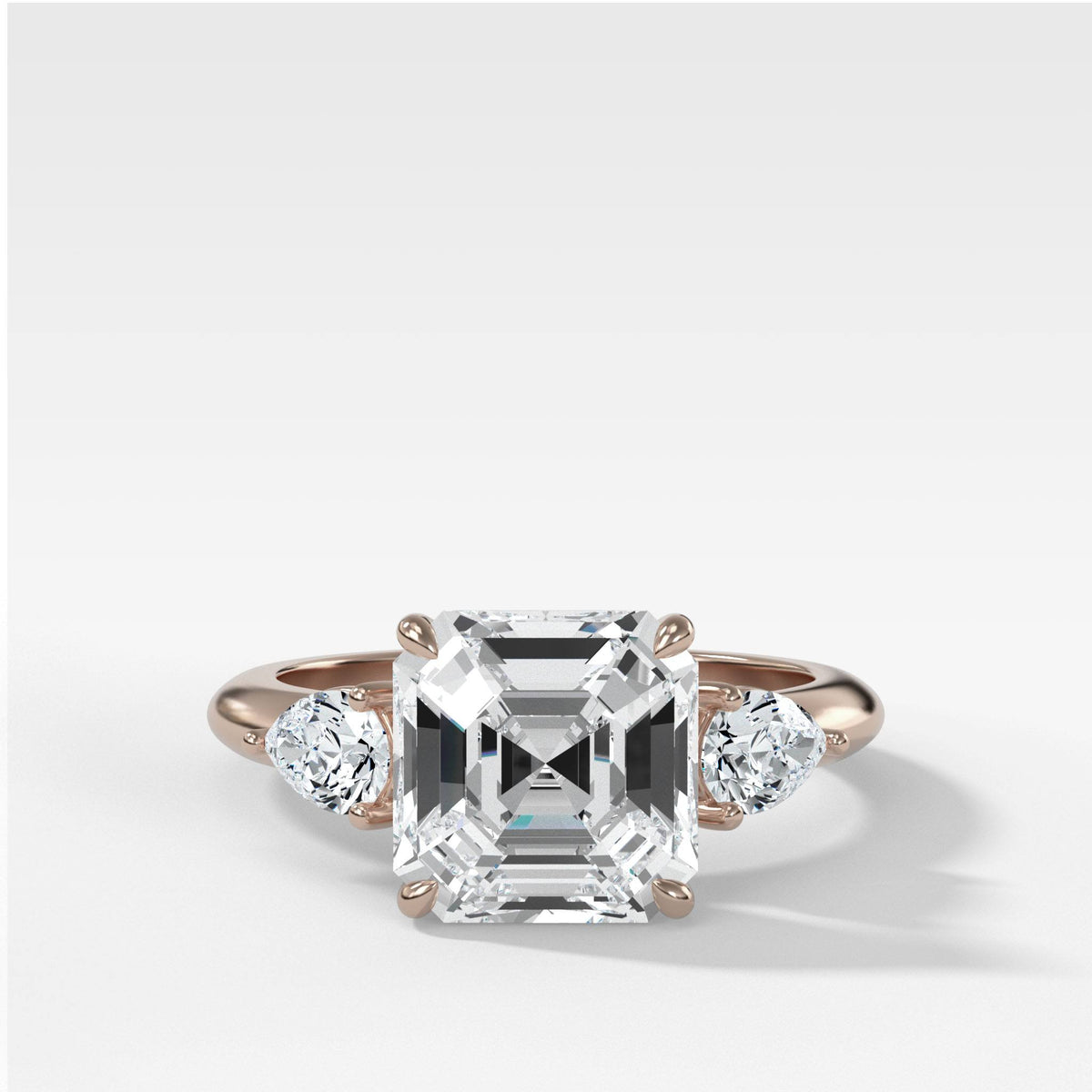 Three Stone Engagement Ring With Pear Side Stones and Asscher Cut by Good Stone in Rose Gold