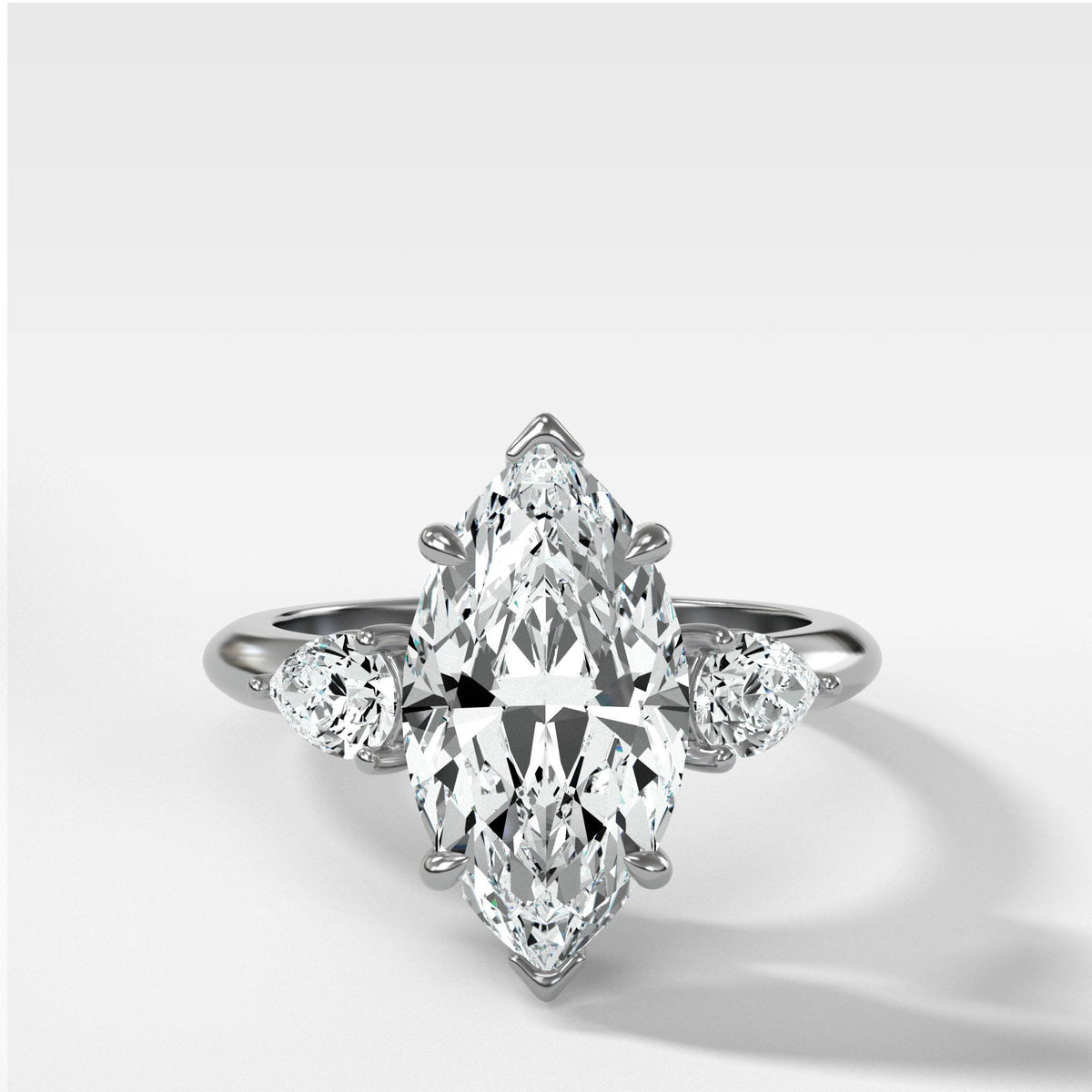 Three Stone Engagement Ring With Pear Side Stones and Marquise Cut by Good Stone in White Gold