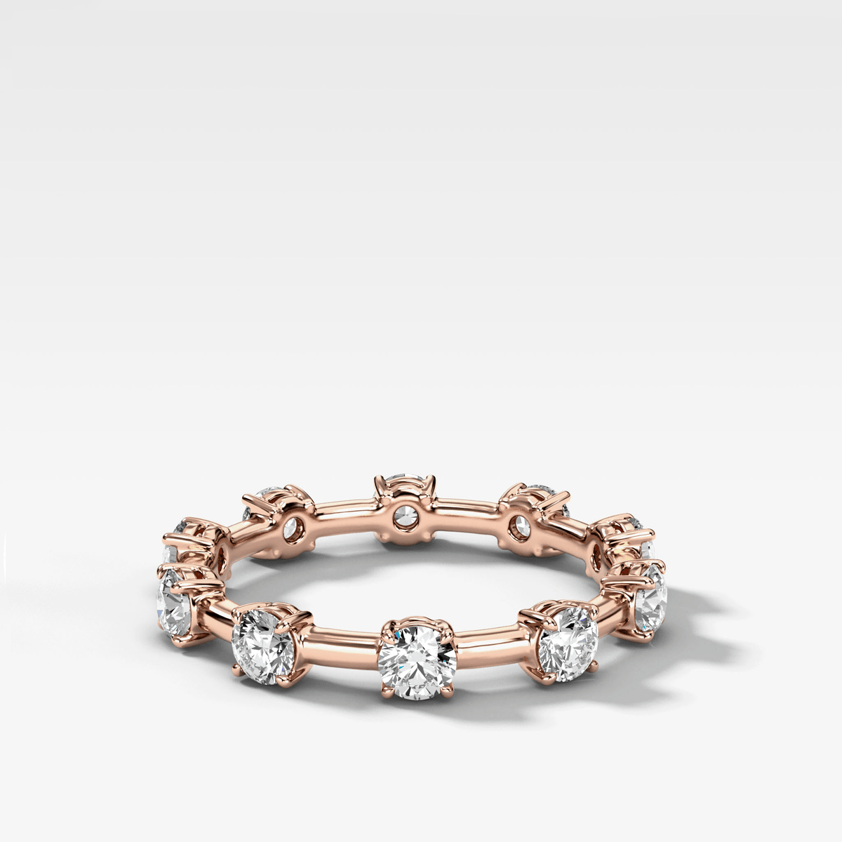 Claw Diamond Band: Jumbo Spaced Eternity Band by Good Stone in Rose Gold