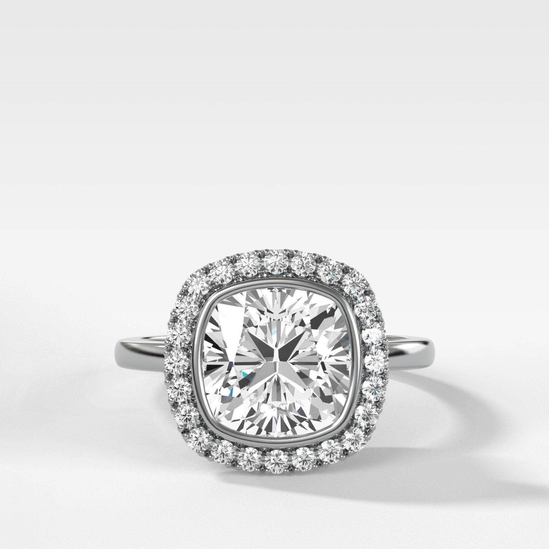 Bezel Set Halo Engagement Ring With Cushion Cut Diamond - GOODSTONE