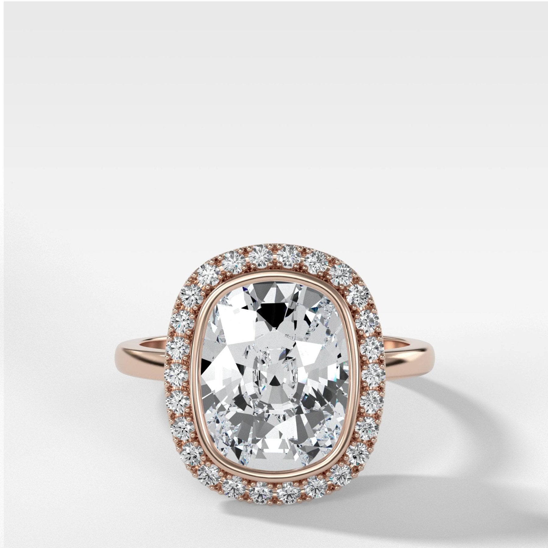 Bezel Set Halo Engagement Ring With Elongated Cushion Cut Diamond - GOODSTONE