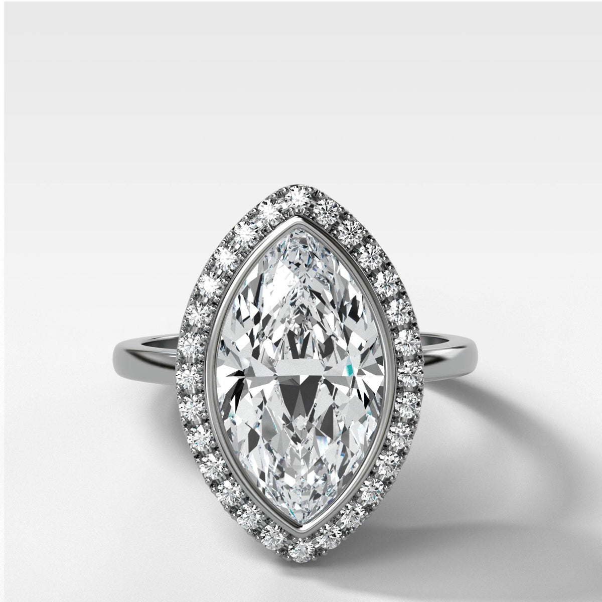 Bezel Set Halo Engagement Ring With Marquise Cut Diamond - GOODSTONE