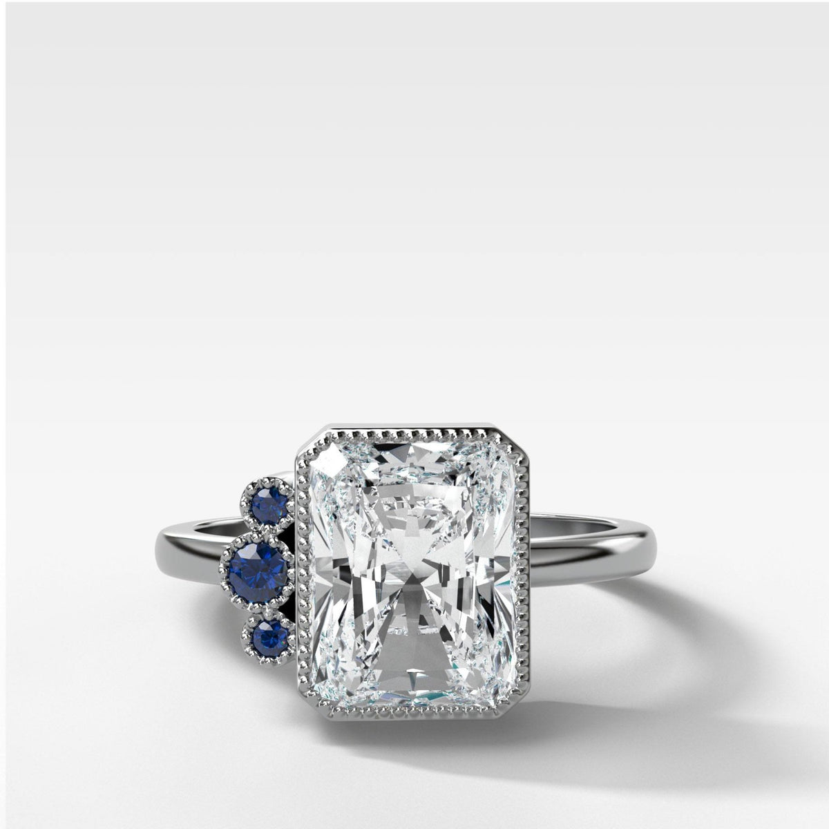 Blue Sapphire Cluster Engagement Ring With Elongated Radiant Cut - GOODSTONE