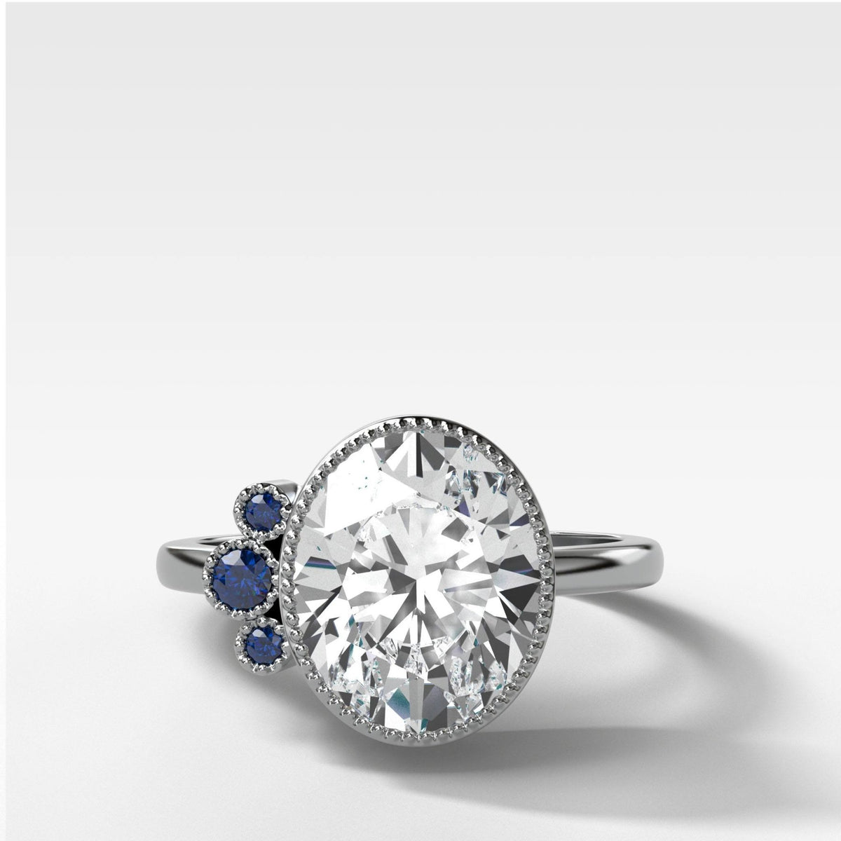Blue Sapphire Cluster Engagement Ring With Oval Cut - GOODSTONE