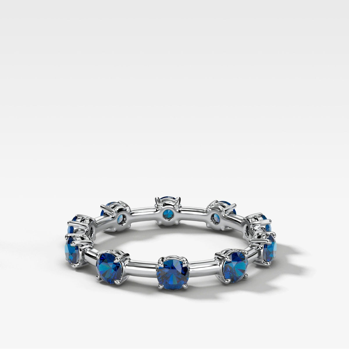 Claw Diamond Band: Jumbo Spaced Eternity Band with Blue Sapphire - GOODSTONE
