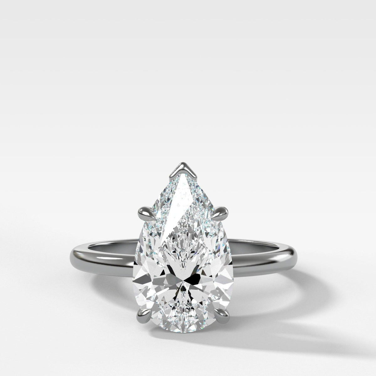 Crescent Solitaire Engagement Ring With Pear Cut Diamond - GOODSTONE