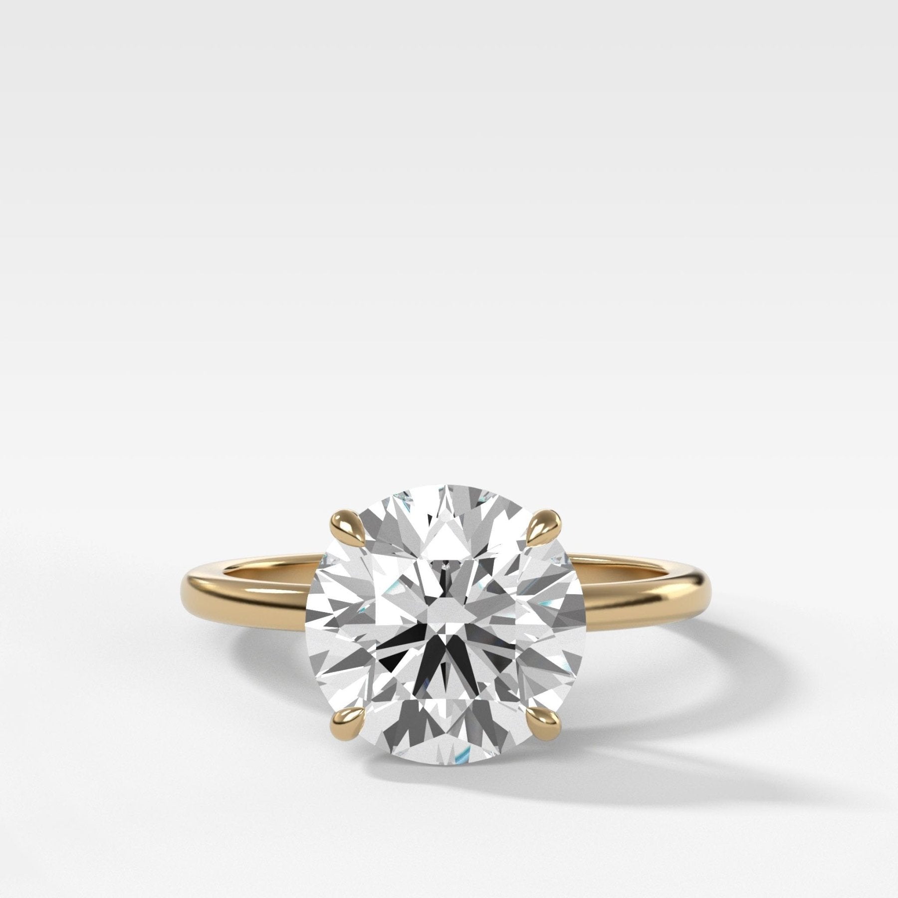 Crescent Solitaire Engagement Ring With Round Cut Diamond - GOODSTONE