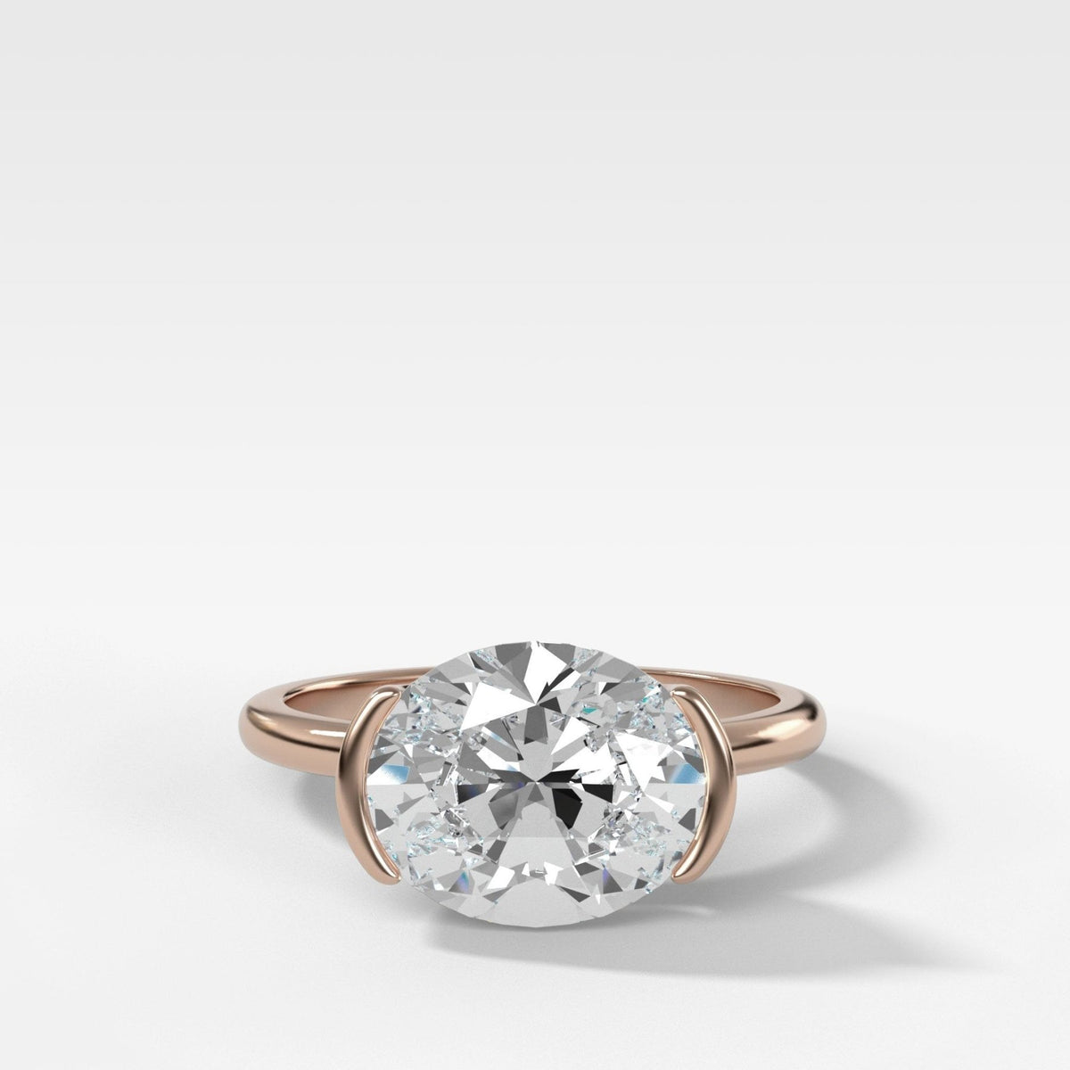 East West Half Bezel Solitaire Engagement Ring With Oval Cut Diamond - GOODSTONE