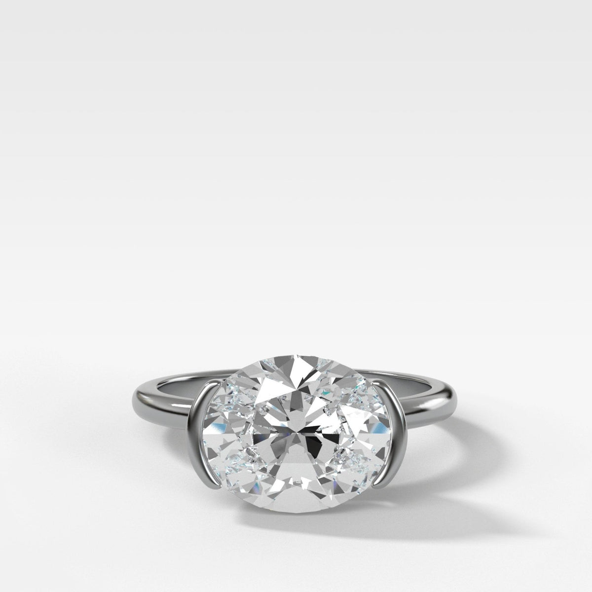 East West Half Bezel Solitaire Engagement Ring With Oval Cut Diamond - GOODSTONE