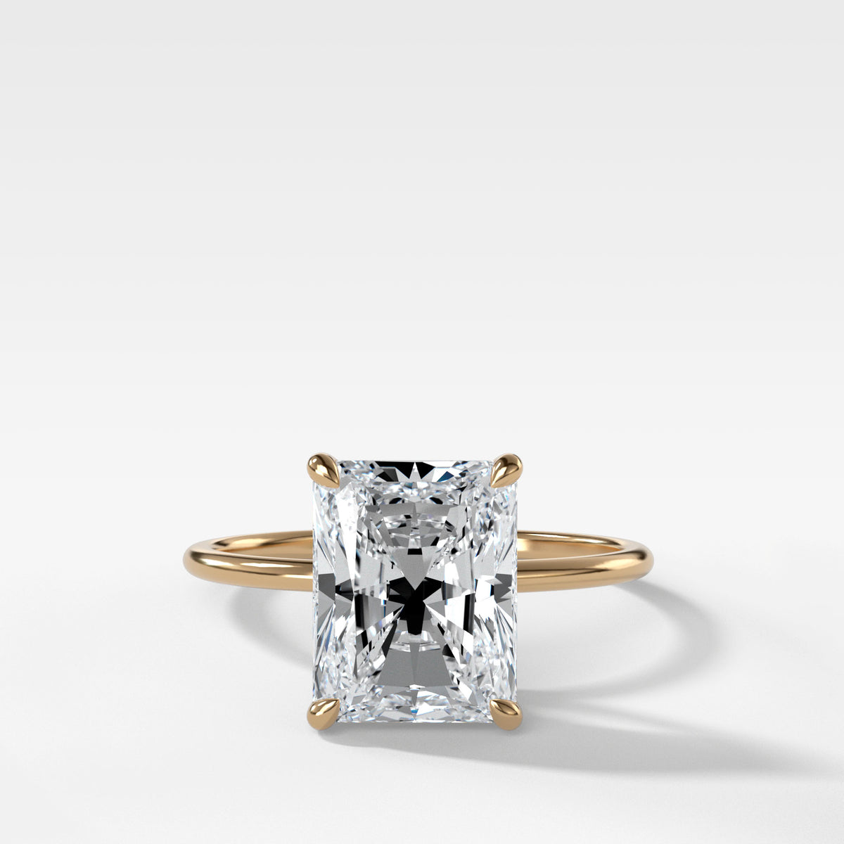 Thin + Simple Solitaire With Elongated Radiant Cut by Good Stone in Yellow Gold