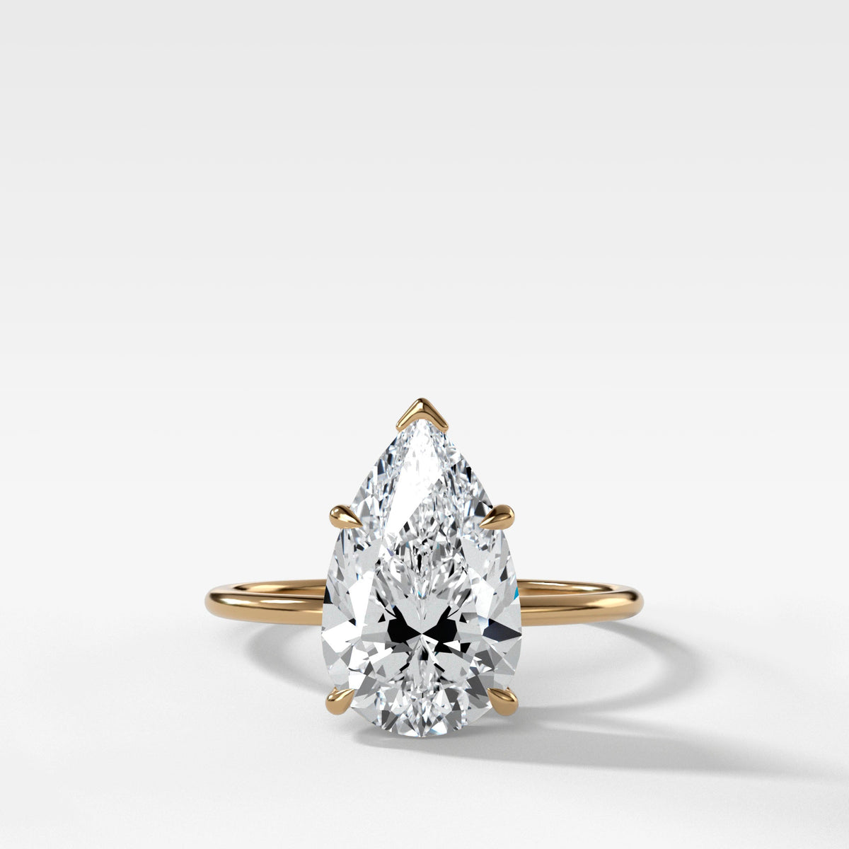 Thin + Simple Solitaire With Pear Cut by Good Stone in Yellow Gold