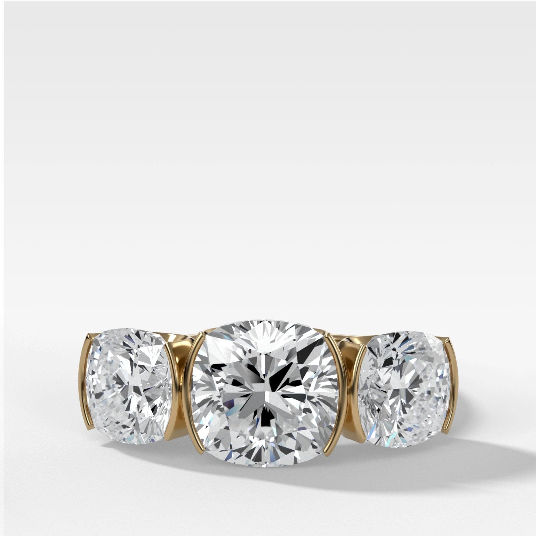 Half Bezel Triad Engagement Ring With Cushion Cut Diamonds - GOODSTONE