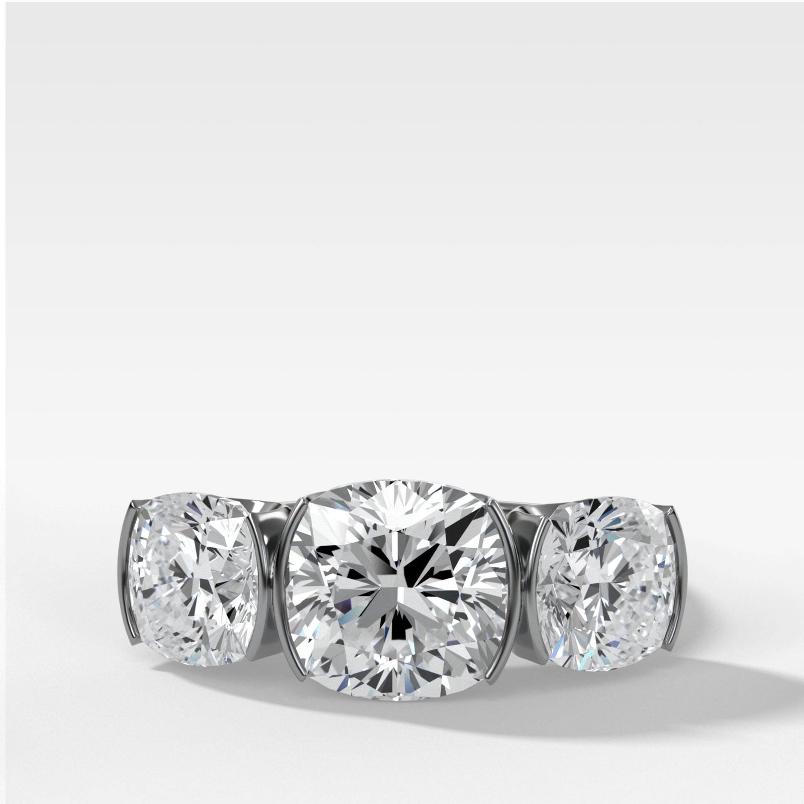 Half Bezel Triad Engagement Ring With Cushion Cut Diamonds - GOODSTONE