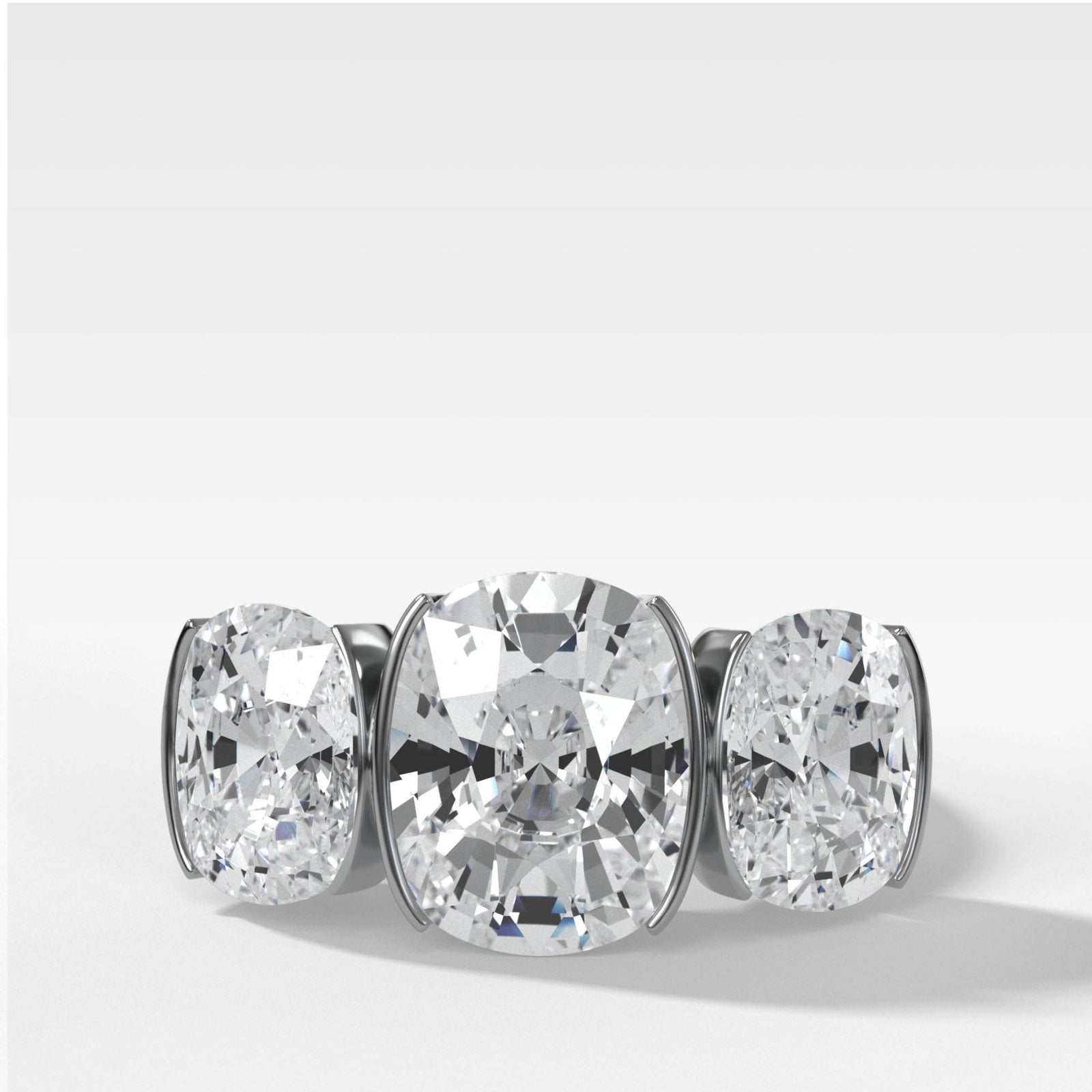 Half Bezel Triad Engagement Ring With Elongated Cushion Cut Diamonds - GOODSTONE