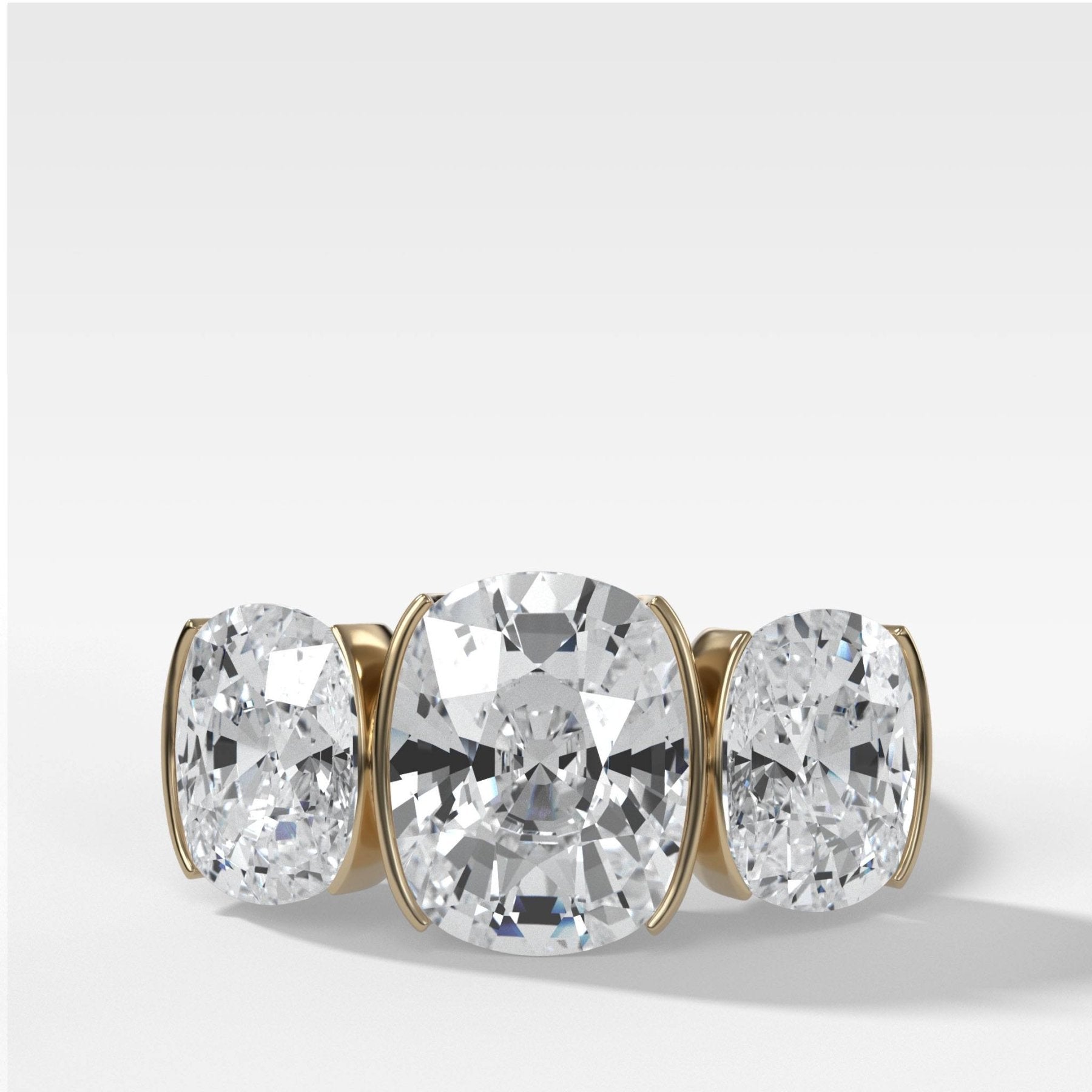 Half Bezel Triad Engagement Ring With Elongated Cushion Cut Diamonds - GOODSTONE