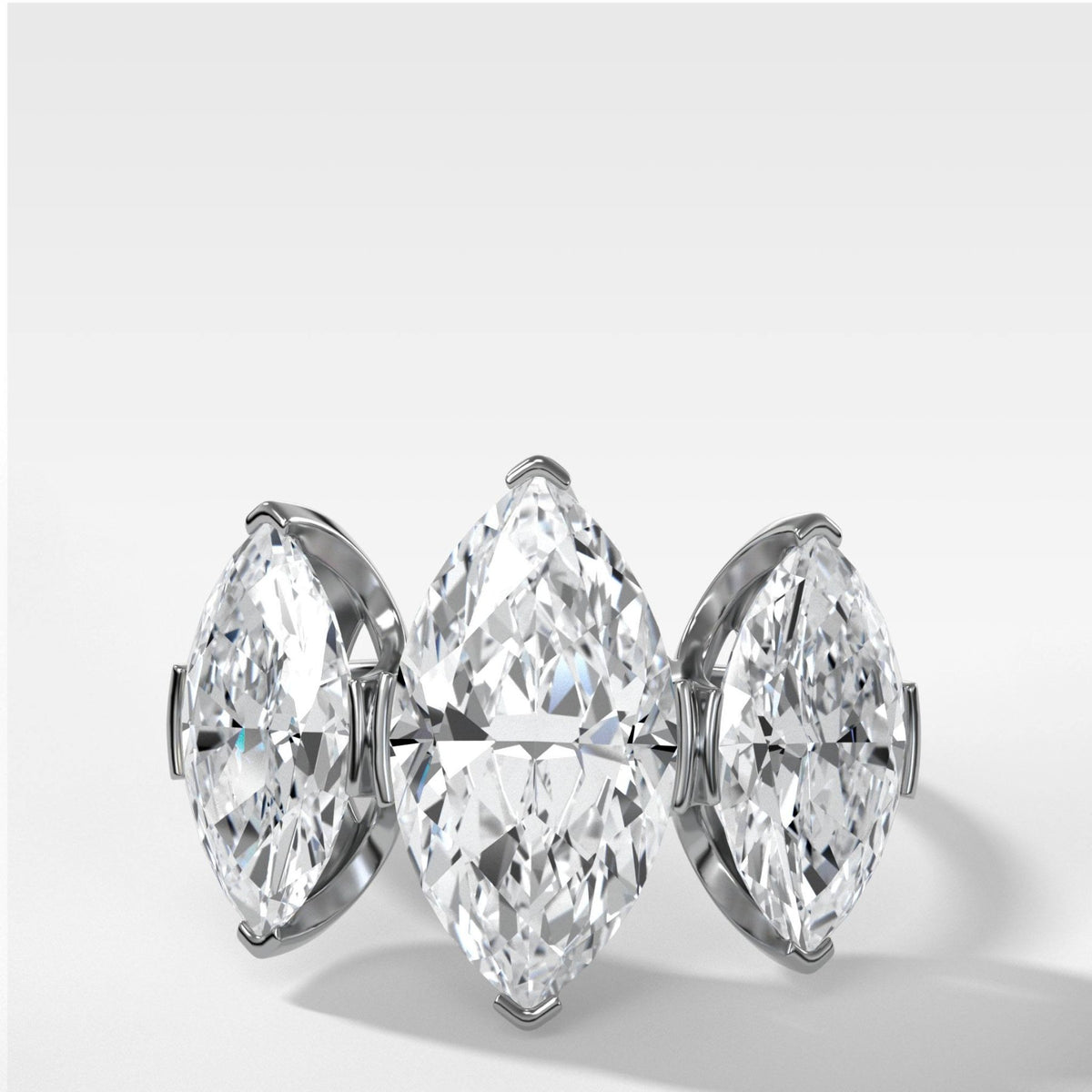 Half Bezel Triad Engagement Ring With Marquise Cut Diamonds - GOODSTONE