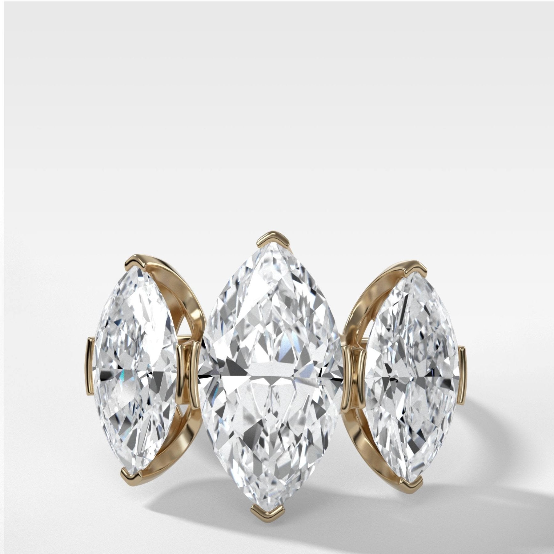 Half Bezel Triad Engagement Ring With Marquise Cut Diamonds - GOODSTONE