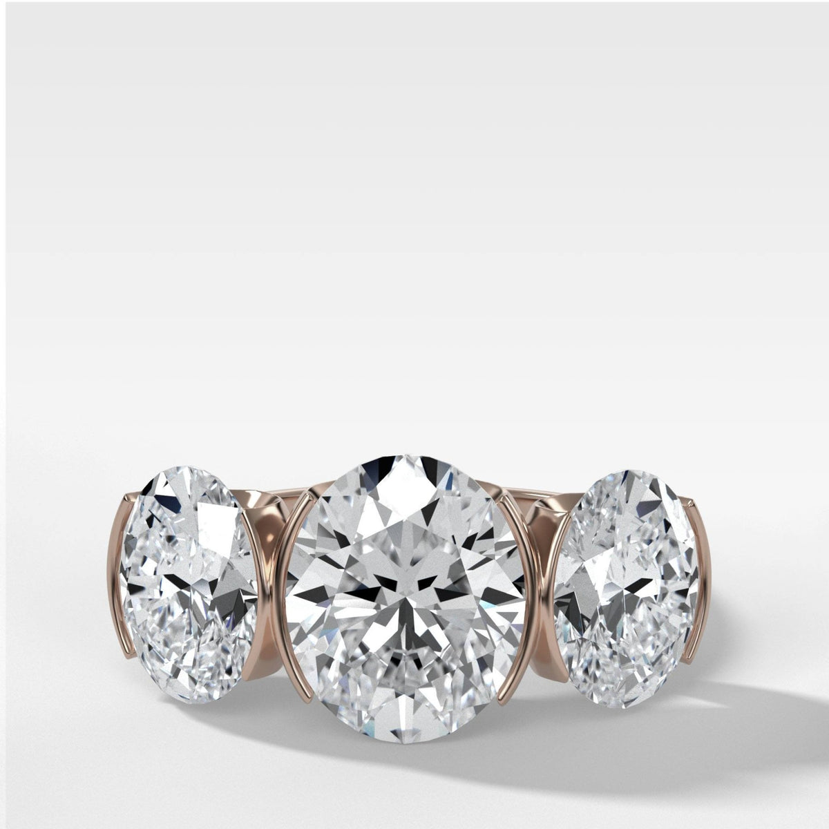 Half Bezel Triad Engagement Ring With Oval Cut Diamonds - GOODSTONE