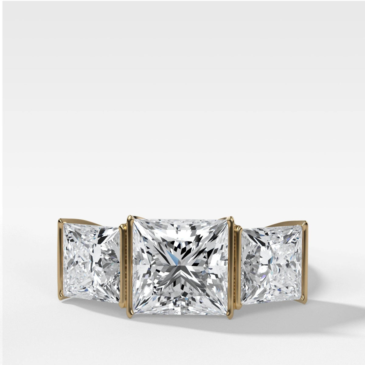 Half Bezel Triad Engagement Ring With Princess Cut Diamonds - GOODSTONE