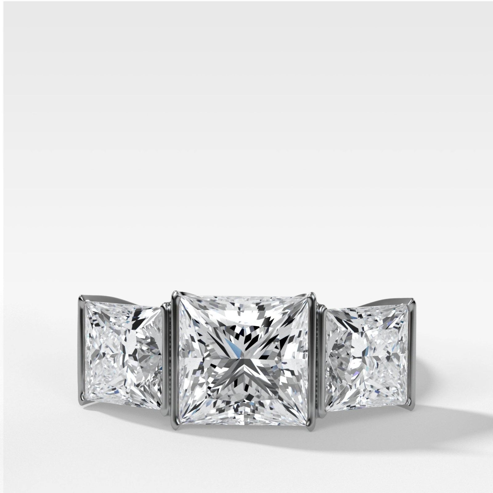 Half Bezel Triad Engagement Ring With Princess Cut Diamonds - GOODSTONE