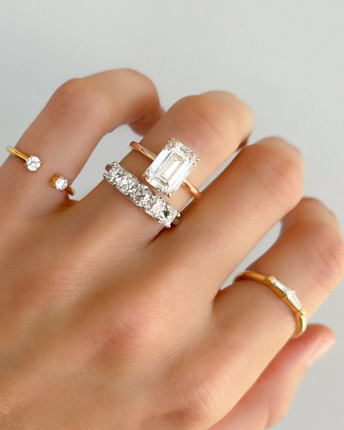 Highlight Crescent Solitaire With Emerald Cut by Good Stone available in Gold and Platinum