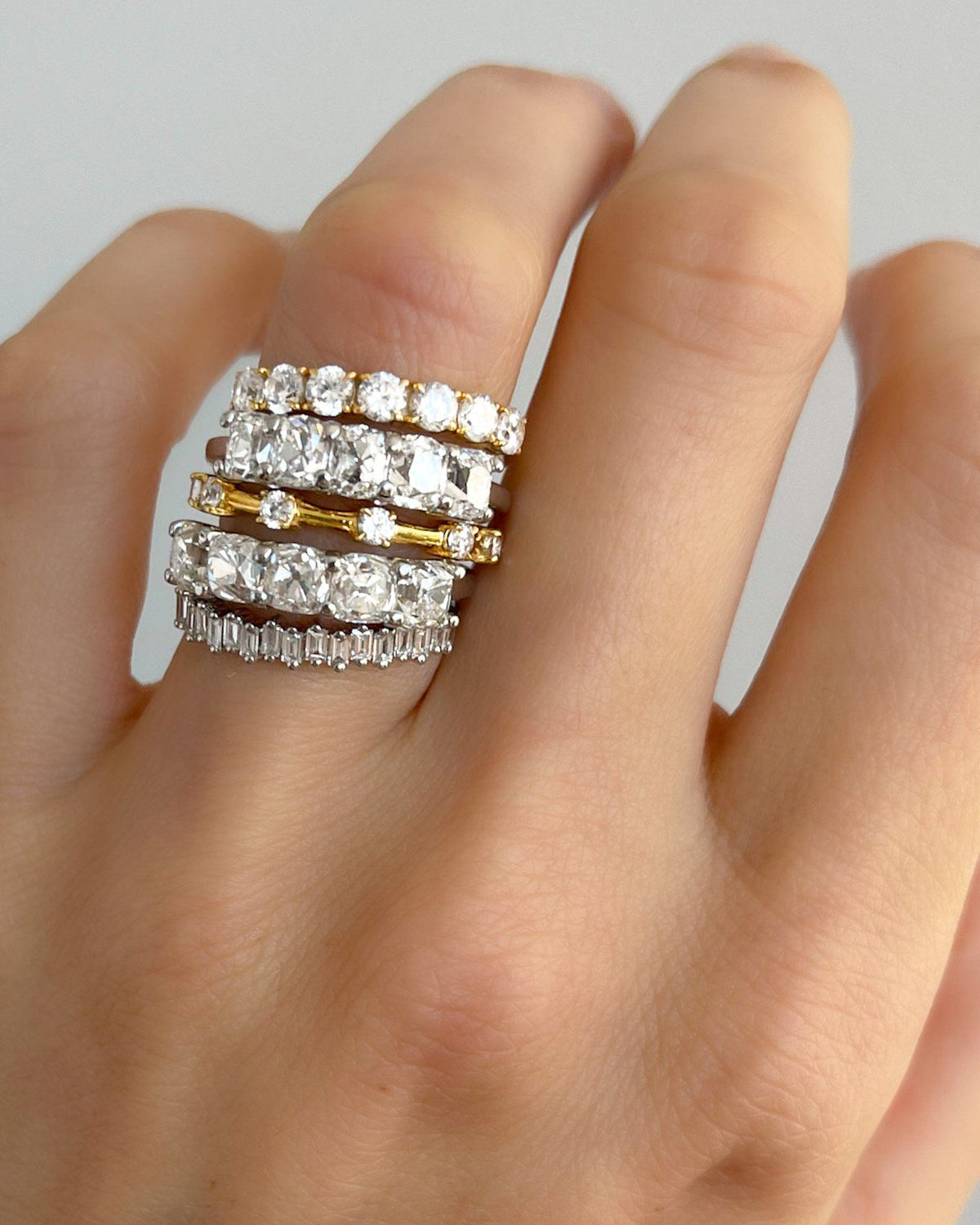 Highlight Claw Diamond Band: Spaced Eternity Band by Good Stone available in Gold and Platinum