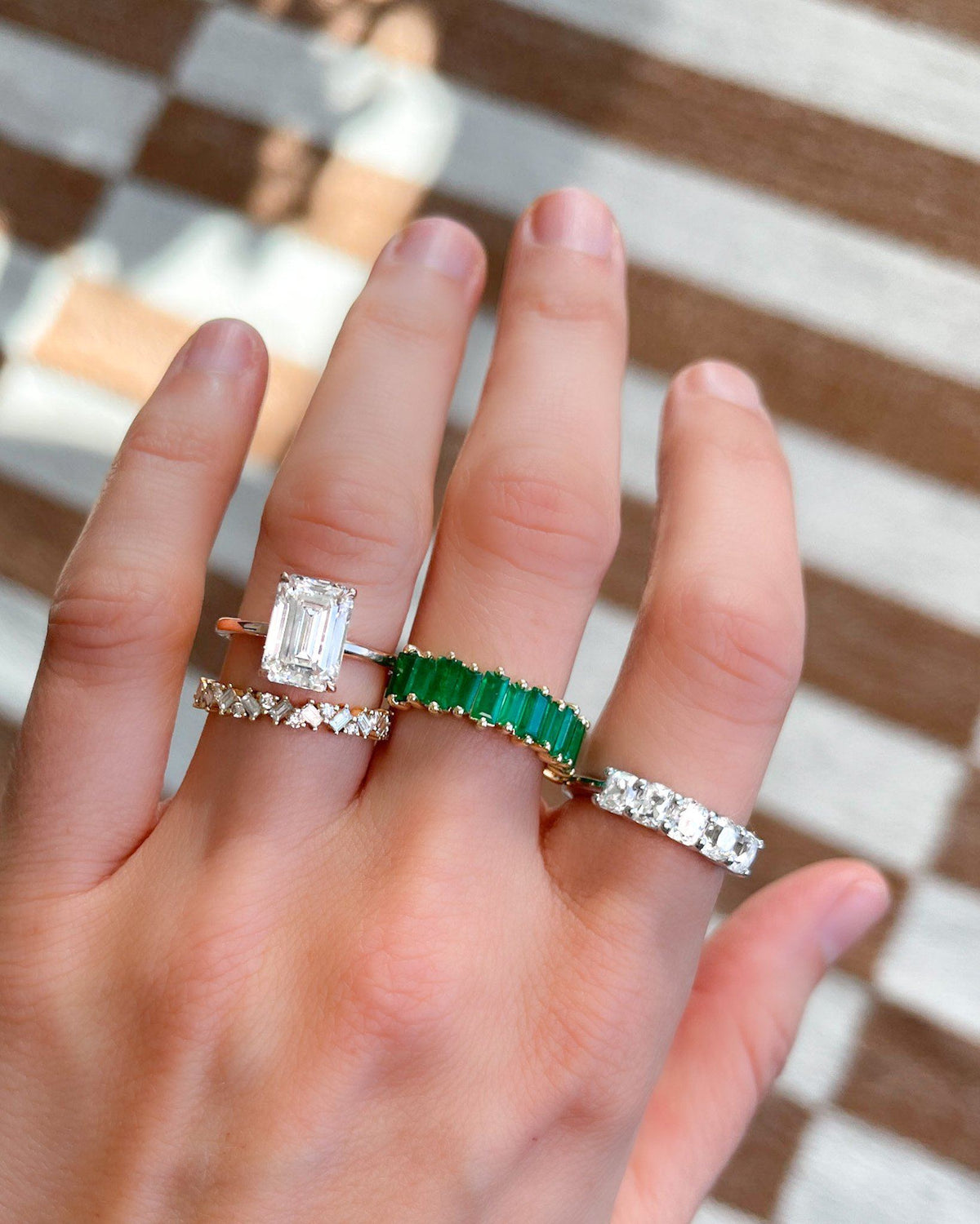 Crescent Solitaire With Emerald Cut (North South) by Good Stone available in Gold and Platinum